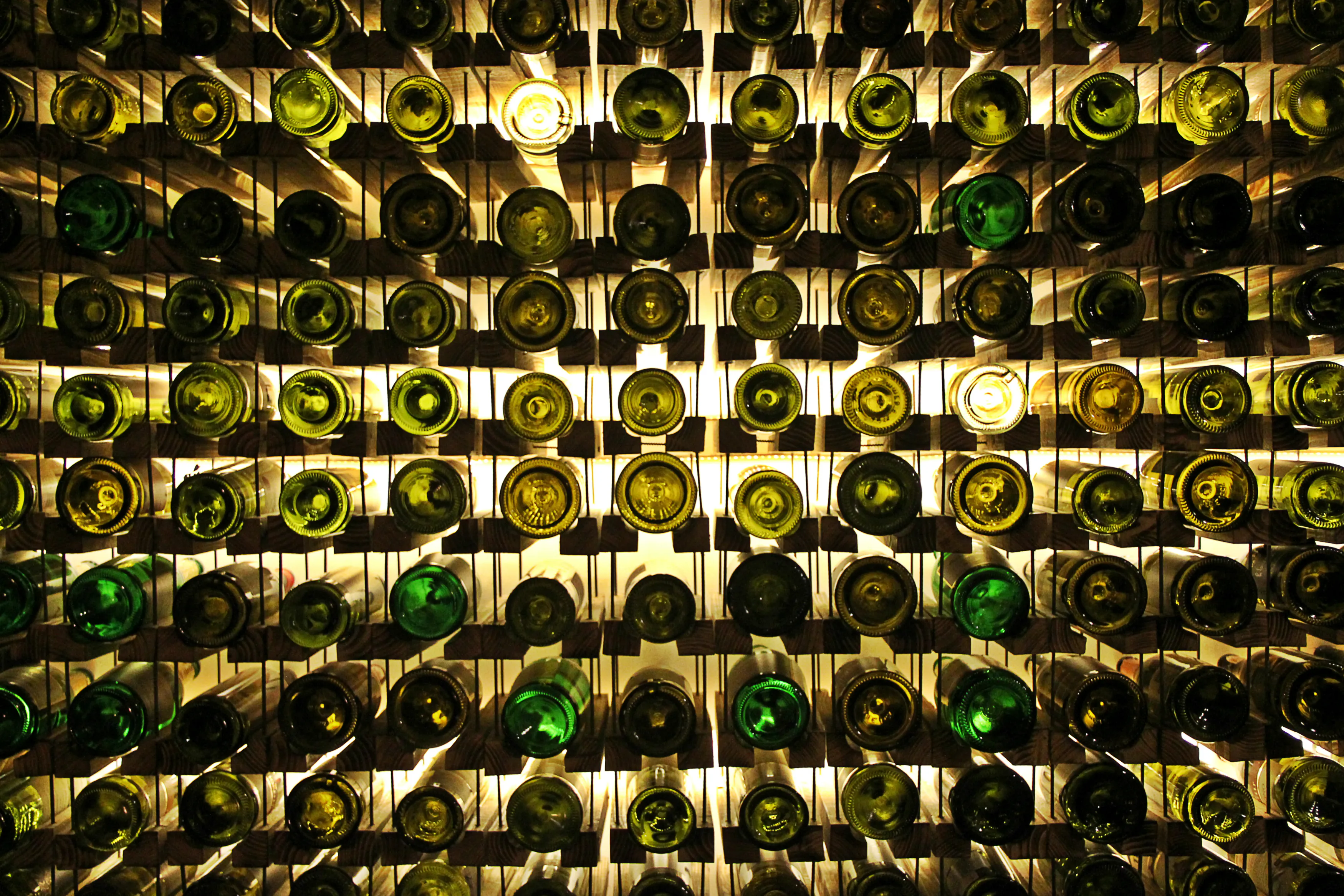 looking up at wine bottles