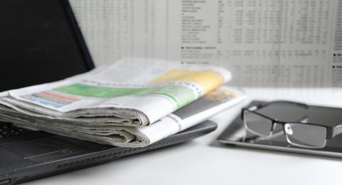 newspaper and glasses 